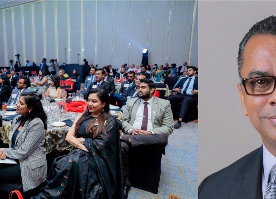 Country Manager of BNI Sri Lanka - Glenn Lord on right with attendees of a previous BNI National Conference on left